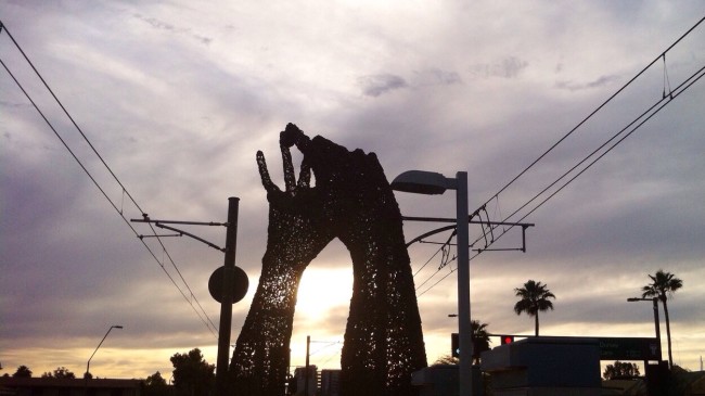 Tempe light rail station art - hands